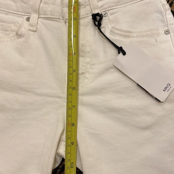 MANGO (MNG)white denim shorts. Raw hem Size label is European. Approx size 24 - Picture 5 of 8
